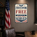 Freedom Isn't Free Because of Those Who Served metal sign with vintage patriotic / military style — Freedom Isn't Free