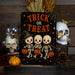 Trick or Treat Vintage Walking Skeletons metal sign with gothic halloween style — Trick or Treat Vintage Walking Skeletons