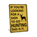 Rustic yellow metal hunting sign reading If You're Looking for a Sign to Go Hunting This Is It with deer silhouette