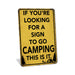 Rustic yellow metal camping sign reading If You're Looking for a Sign to Go Camping This Is It with tent and forest silhouette