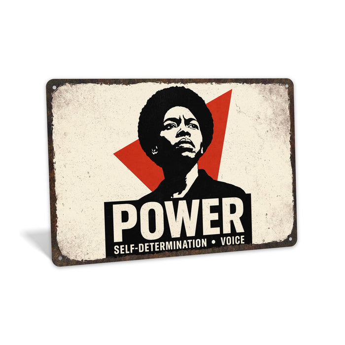 Rustic metal wall sign displaying the words “Black Power” in bold typography, designed as cultural statement wall décor.