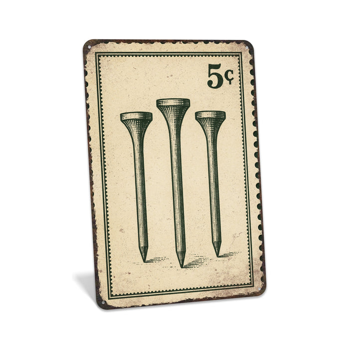 Rustic metal sign featuring a vintage-style stamp with three golf tees.

