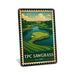 Rustic metal sign featuring a vintage stamp-style illustration inspired by TPC Sawgrass
