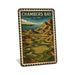 Rustic metal sign featuring a vintage stamp-style illustration inspired by Chambers Bay
