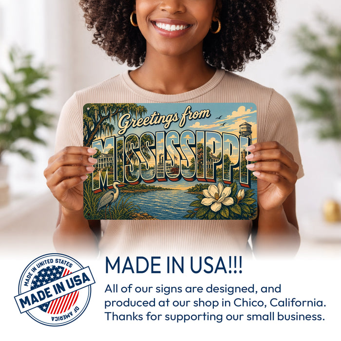 Greetings from Mississippi metal sign with horizontal vintage 'Greetings from Mississippi' large-letter postcard with