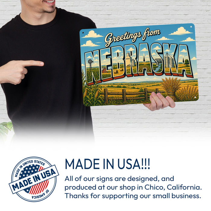 Greetings from Nebraska metal sign with horizontal vintage 'Greetings from Nebraska' large-letter postcard with Nebraska