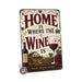 Home Is Where the Wine Is metal sign with vintage wine humor sign style — Home Is Where the Wine Is