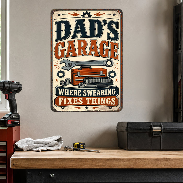 Dad's Garage Workshop Humor metal sign with vintage layout with wrench, red toolbox, socket set, ratchet, gears, and bold