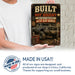 Built Not Bought Truck Garage metal sign with vintage layout with lifted square-body Chevy K10 on mud tires, tool chest