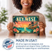 Key West Florida metal sign with art-deco vintage travel poster style of Key West Florida (florida keys)