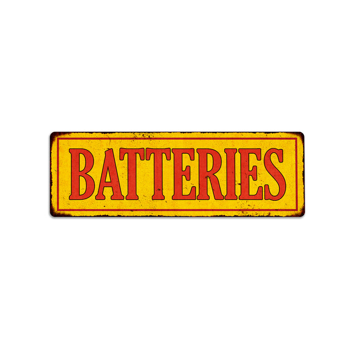 Batteries in Vintage Looking Metal Sign Shop Oil Gas Garage