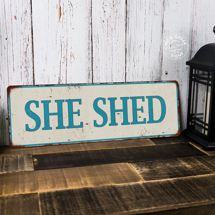 SHE SHED Distressed Look Metal Sign 106180076003
